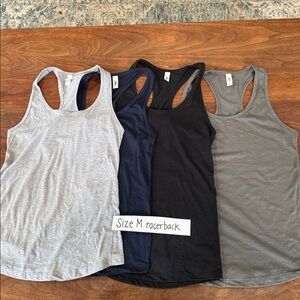 Lot of 23 muscle tees and tanks